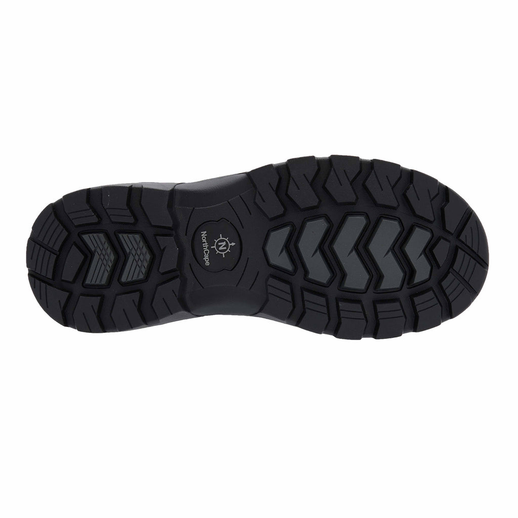 Black shoe sole with tread pattern on a white background