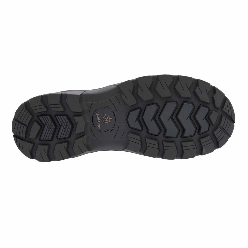 Black sole of a shoe with tread pattern on a white background
