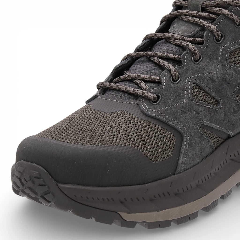 Gray hiking boot with visible branding on a white background