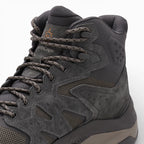 Gray hiking boot with visible branding on a white background