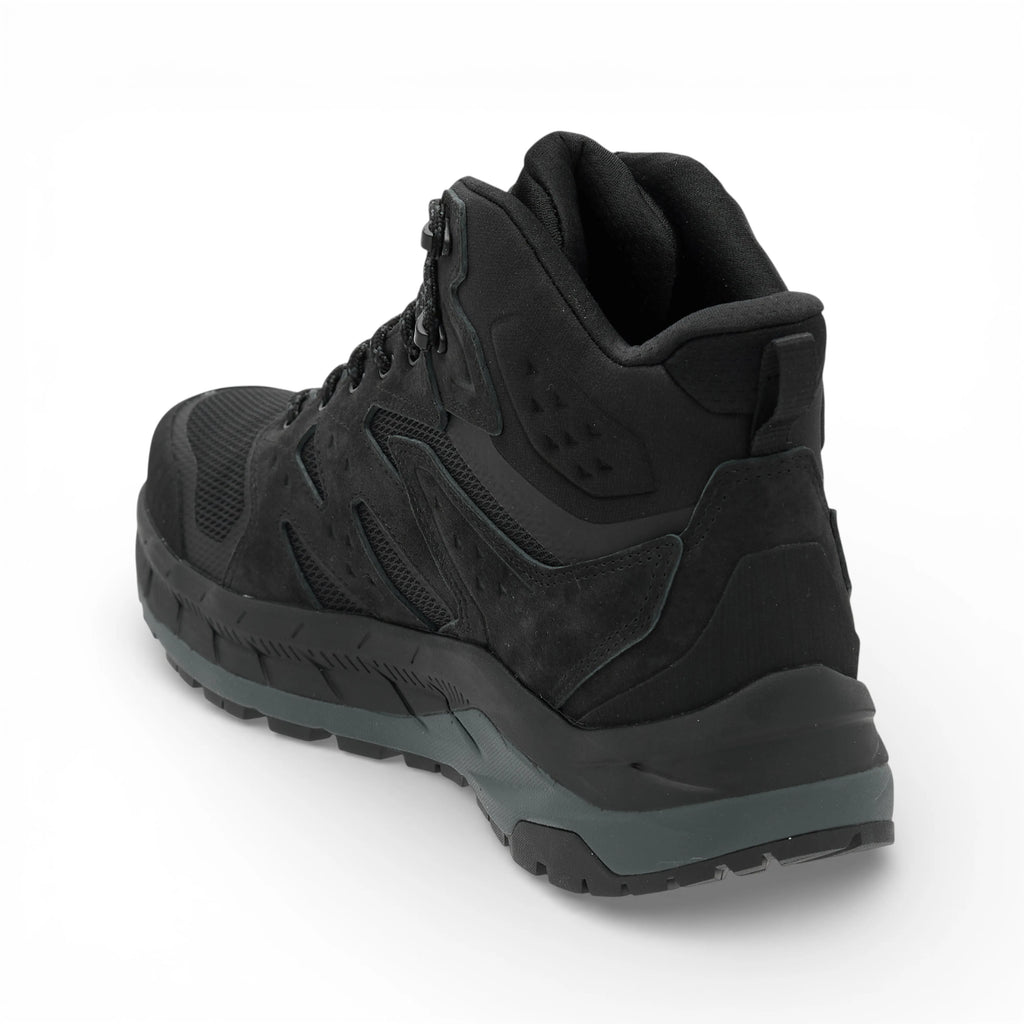 Black high-top sneaker with a textured sole on a white background