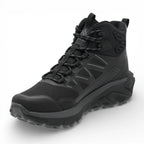 Black high-top boot with textured sole on a white background