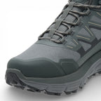 Gray hiking shoe with brand logo on a white background