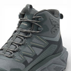 Gray hiking boot with brand logo on a white background