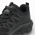 Black hiking shoe with brand logo on a white background