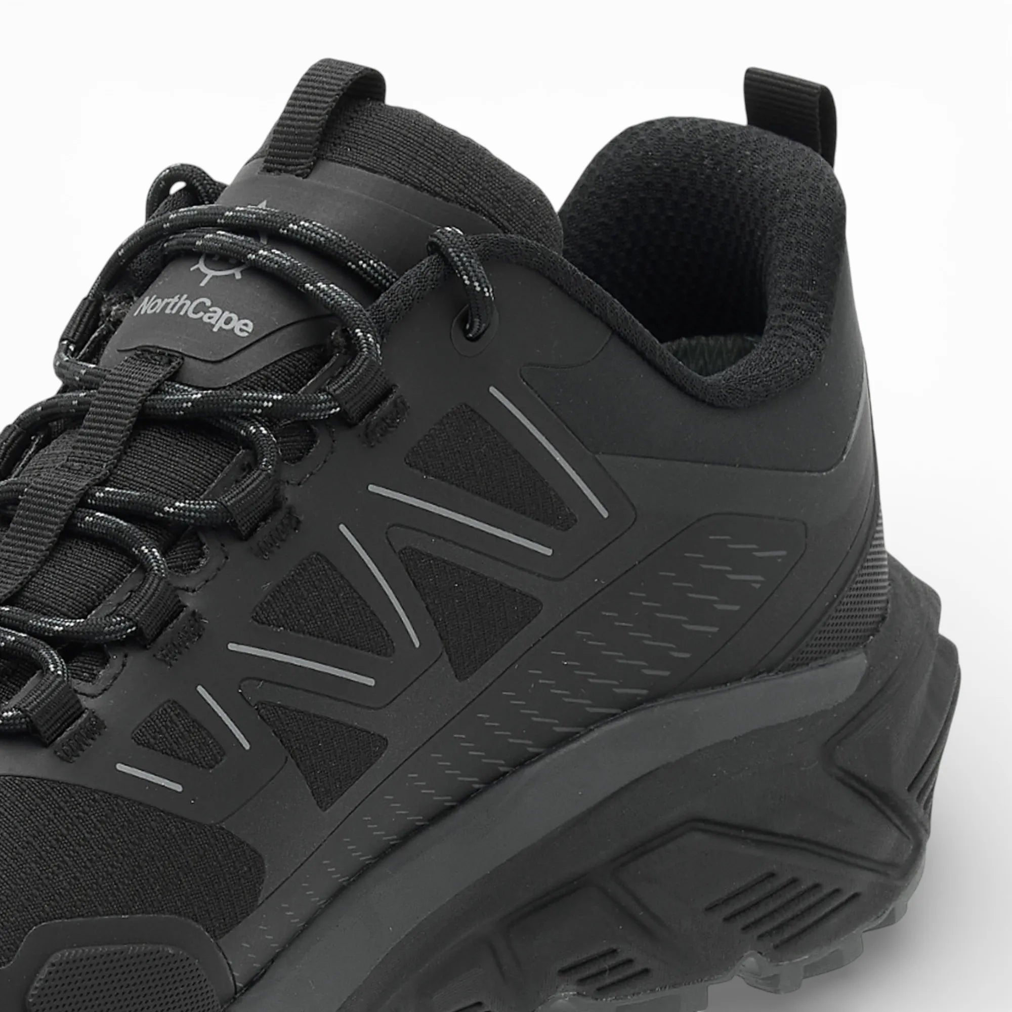 Black hiking shoe with brand logo on a white background