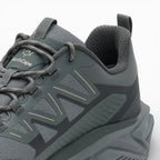 Gray athletic shoe with visible branding on a white background