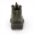 Green and black hiking boot on a white background