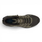 Green and black hiking boot on a white background