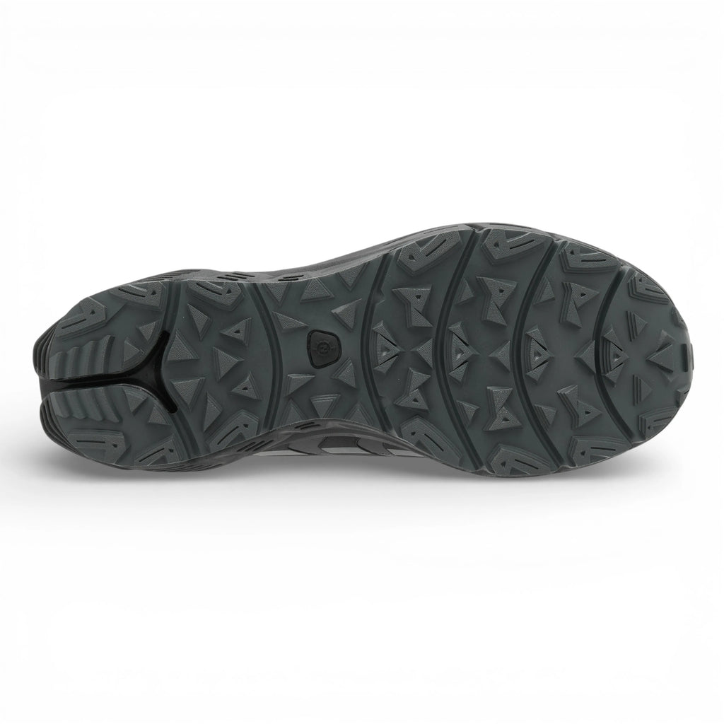 Black hiking boot sole on a white background