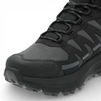 Black hiking boot with visible brand logo on a white background