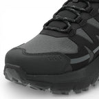 Black and gray hiking shoe on a white background