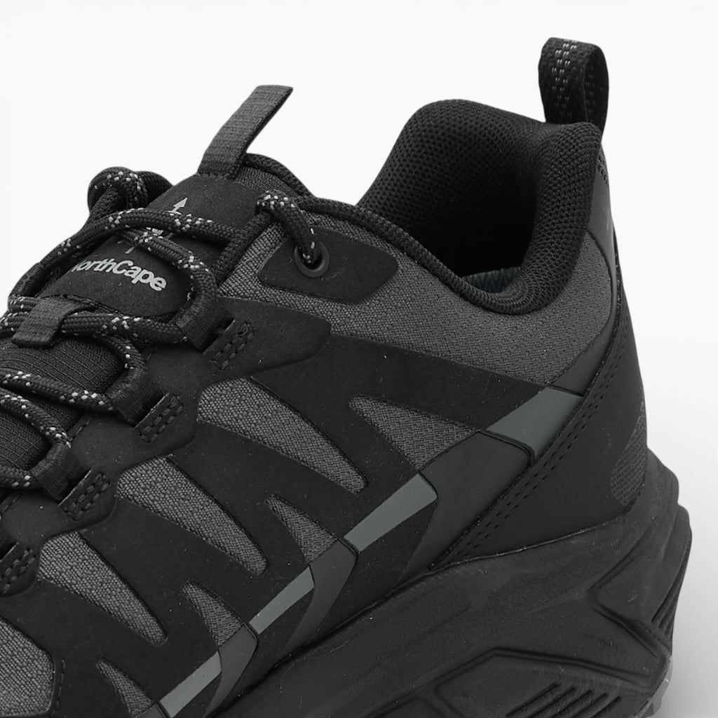 Black and gray sneaker with 'NorthCape' branding on a white background