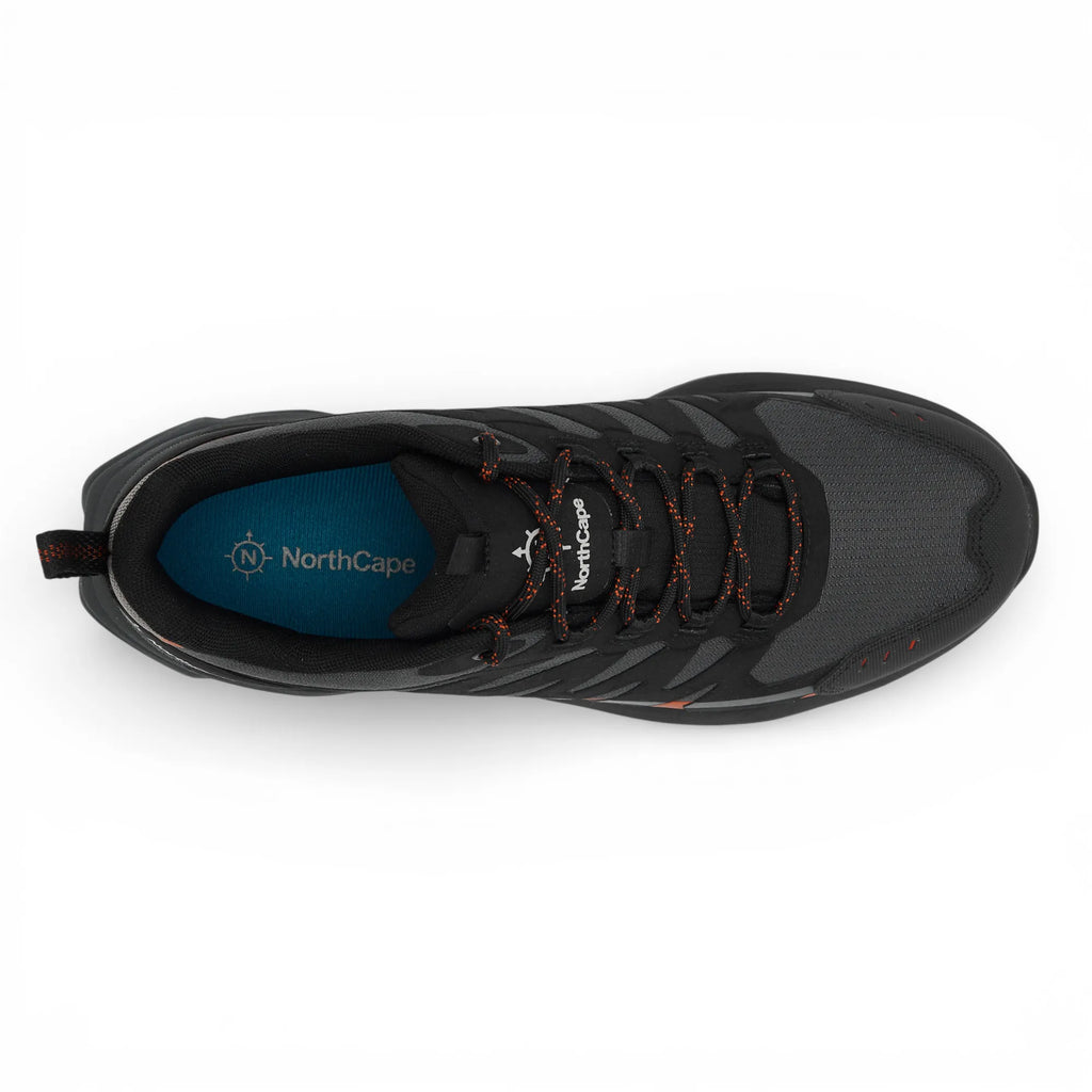 Black athletic shoe with visible branding on a white background