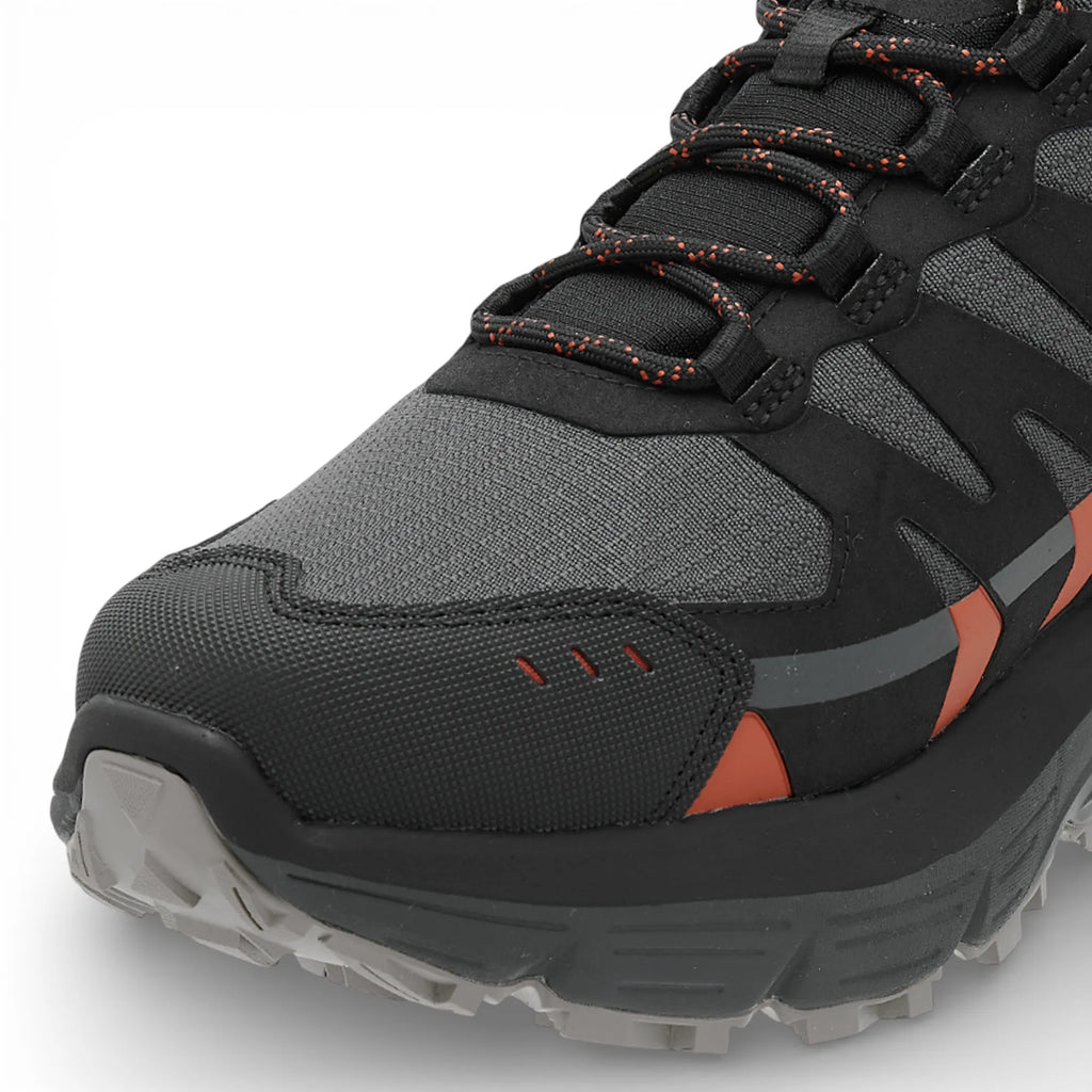 Black and gray hiking shoe with orange accents on a white background