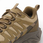 Brown hiking shoe with visible brand logo on a white background
