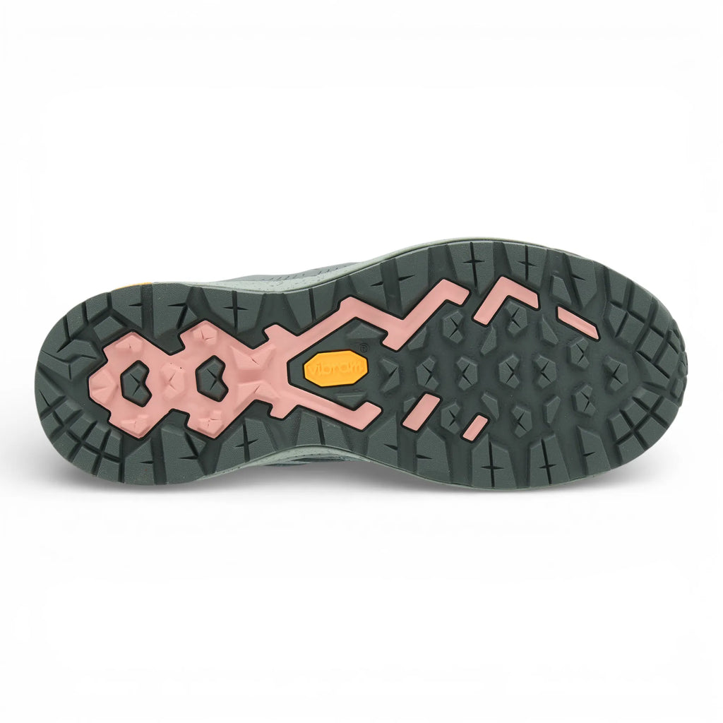 Close-up of a shoe sole with a unique tread pattern on a white background