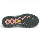 Close-up of a shoe sole with a unique tread pattern on a white background