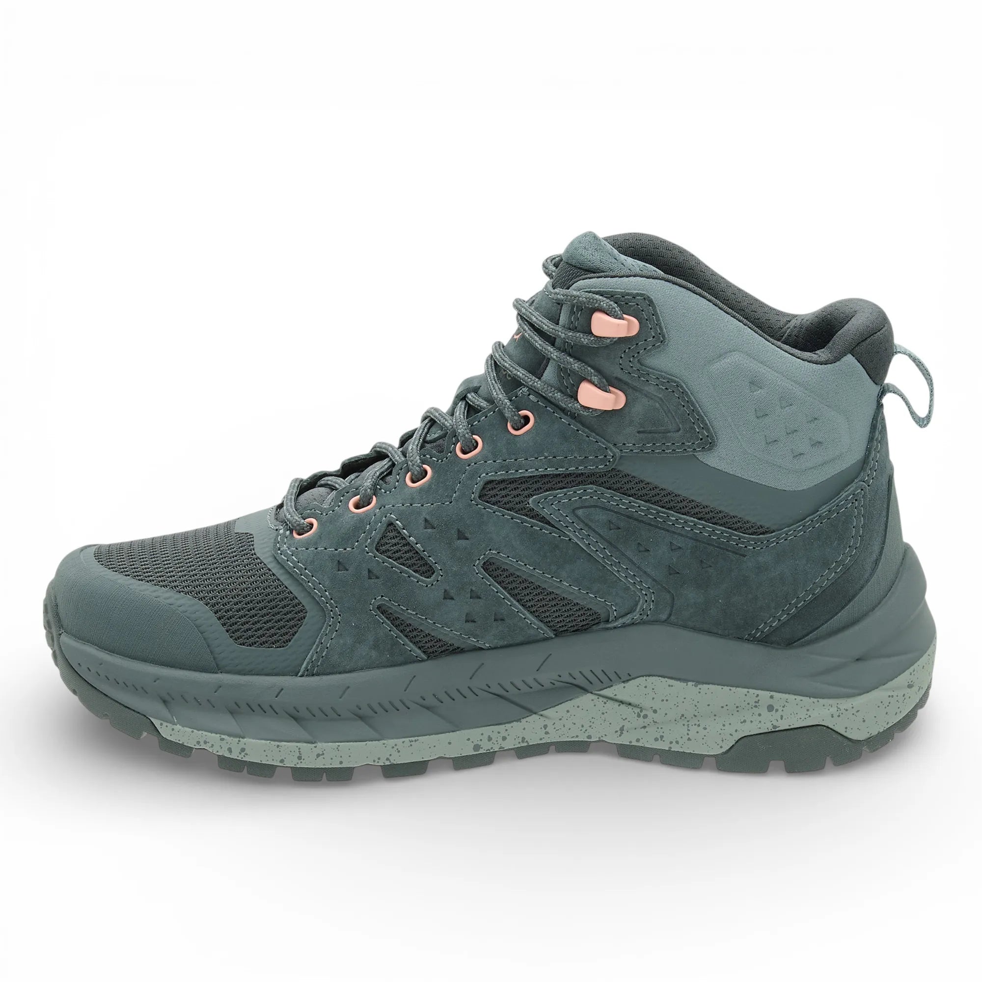 Green hiking boot with pink accents on a white background