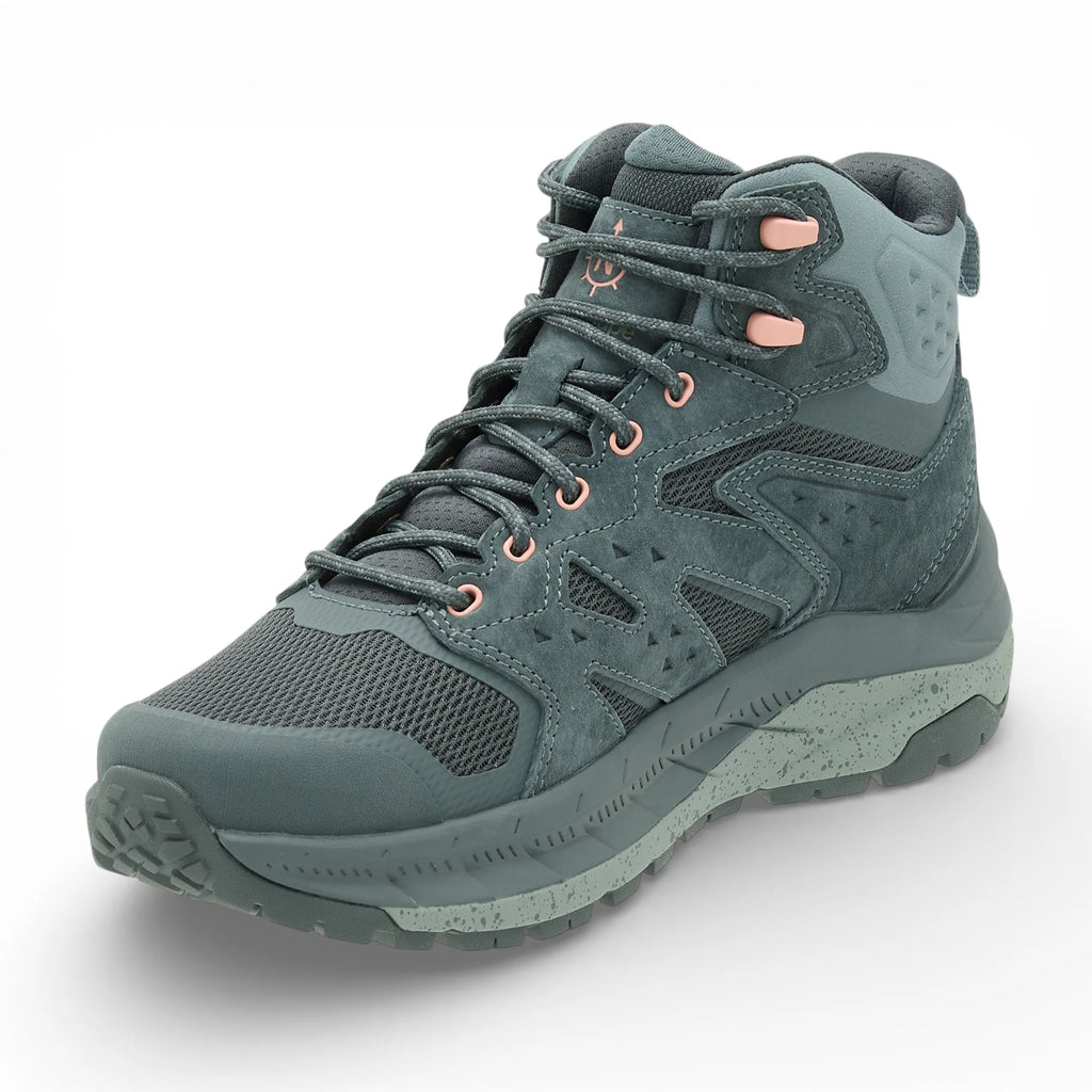 Green hiking boot on a white background