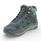 Green hiking boot on a white background