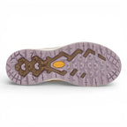 Close-up of a shoe sole with a textured pattern on a white background