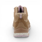 Tan sneaker with purple accents on a white background