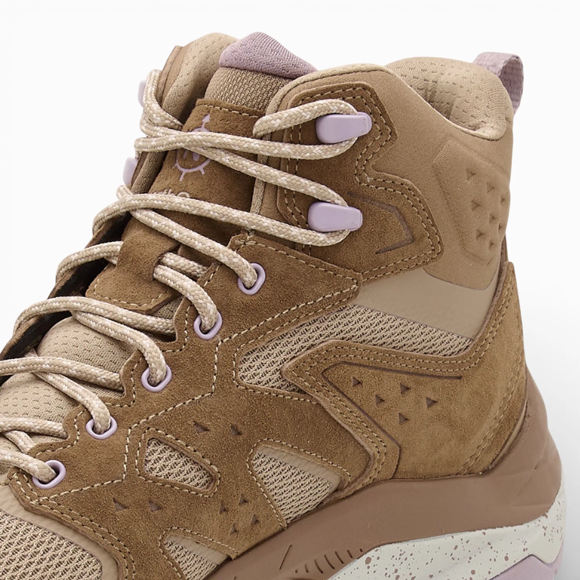 Tan high-top sneaker with white laces on a white background