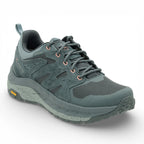Green hiking shoe on a white background