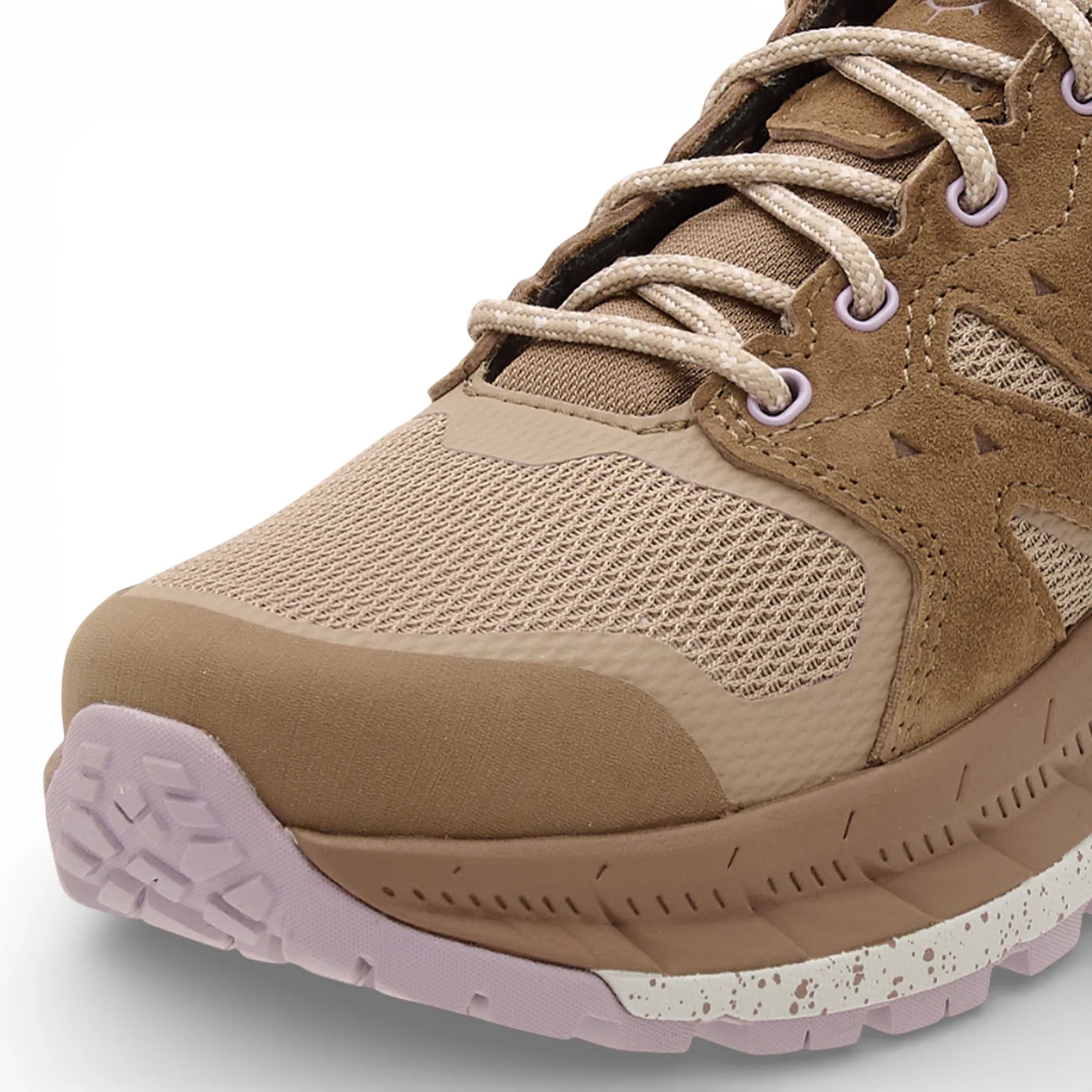 Brown hiking shoe with pink accents on a white background