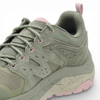 Green and pink sneaker on a white background