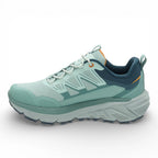 Green hiking shoe with 'North Cape' branding on a white background