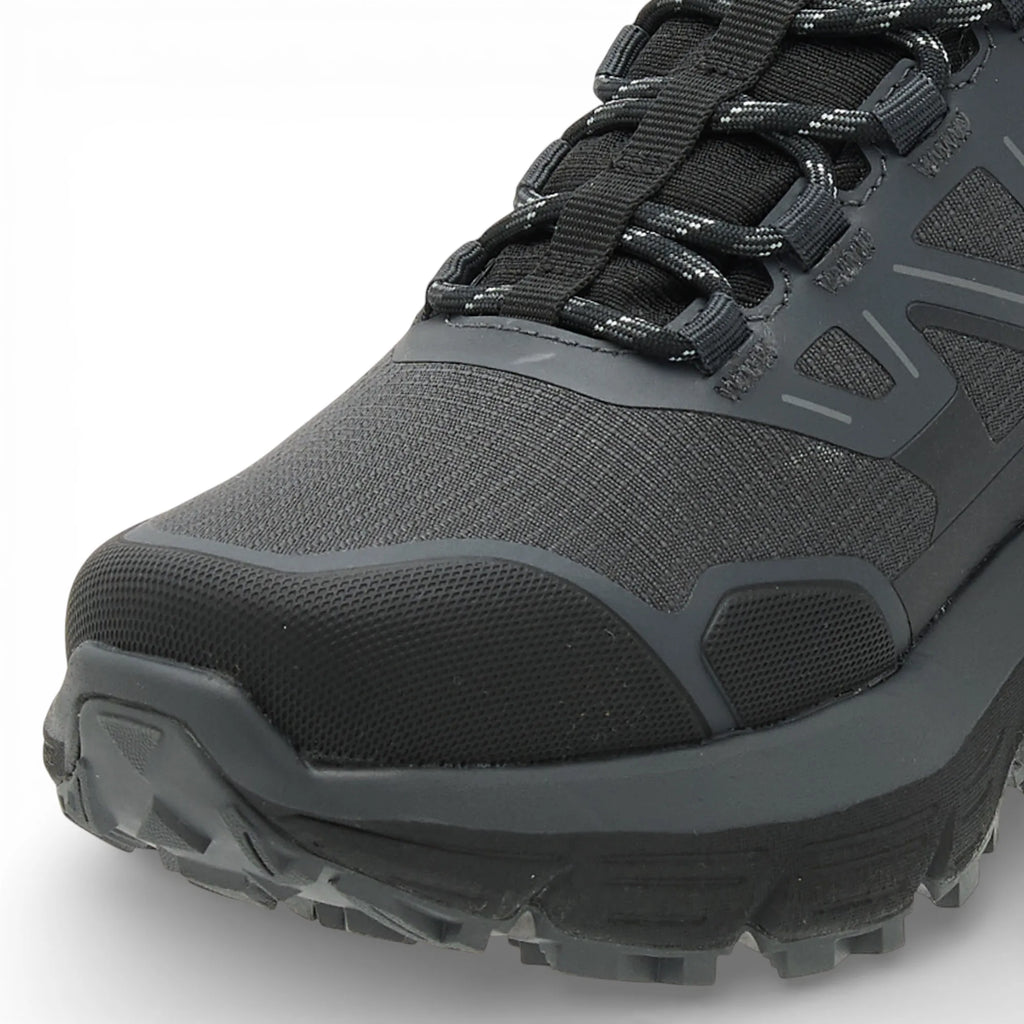 Black hiking shoe with visible brand logo on a white background