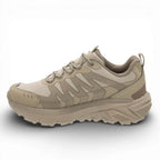 Beige hiking shoe on a white background