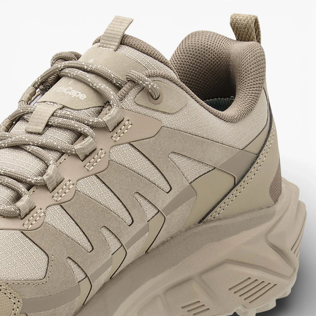 Beige sneaker with a textured design on a light gray background